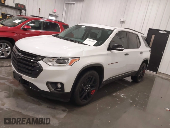 2018 Chevrolet Traverse Premier z VIN 1GNEVJKW4JJ163087, wystawiony jako IAAI lot #41509692 z przebiegiem 118 158 mil mil oraz . Historia ofert i sprzedaży dostępna na DreamBid. Obrazek 18.