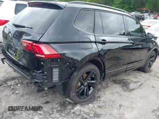 2023 Volkswagen Tiguan SE R-Line Black с VIN 3VVCB7AX2PM083015, выставлен на аукционе IAAI как лот 42129681 с пробегом 13 272 миль миль и . История ставок и продаж доступна на DreamBid. Изображение 4.
