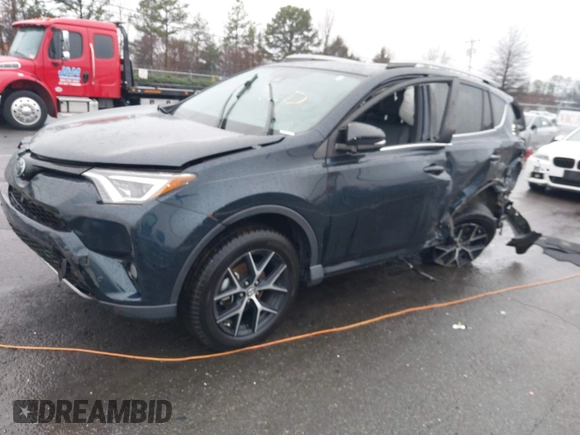 2017 Toyota RAV4 SE with VIN 2T3NFREV3HW372775, listed as a IAAI auction lot 41571705 with 119,015 mi miles and . Bid and sale history available at DreamBid. Image 16.