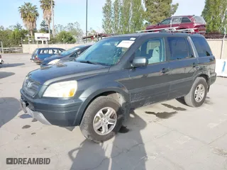 2004 Honda Pilot EX with VIN 2HKYF18414H589485, listed as a IAAI auction lot 42100822 with 172,254 mi miles. Bid and sale history available at carsss.com. Image 2.