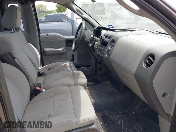 2007 Ford F-150 XL with VIN 1FTRF12237NA17267, listed as a IAAI auction lot 42047396 with 208,931 mi miles. Bid and sale history available at carsss.com. Image 5.