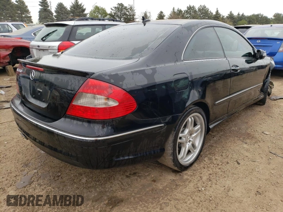 2008 Mercedes-Benz CLK-Class 5.5L with VIN WDBTJ72H08F245331, listed as a Copart auction lot 52142694 with 68,697 mi miles and Salvage Title. Bid and sale history available at carsss.com. Image 3.