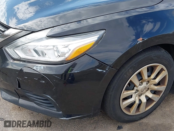 2016 Nissan Altima SR with VIN 1N4AL3AP9GC219286, listed as a IAAI auction lot 42123028 with 73,120 mi miles and . Bid and sale history available at carsss.com. Image 6.
