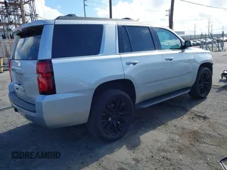 2020 Chevrolet Tahoe LS with VIN 1GNSCAKC2LR227856, listed as a IAAI auction lot 42246510 with 55,132 mi miles and . Bid and sale history available at DreamBid. Image 4.