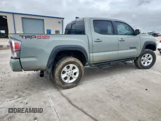 2023 Toyota Tacoma SR with VIN 3TMCZ5AN2PM580515, listed as a Copart auction lot 60422635 with 65,846 mi miles and Salvage title. Bid and sale history available at DreamBid. Image 3.