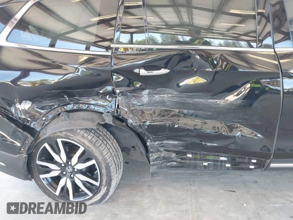 2021 Honda Pilot Touring 8-Passenger z VIN 5FNYF6H99MB049728, wystawiony jako IAAI lot #42194602 z przebiegiem 41 374 mil mil oraz . Historia ofert i sprzedaży dostępna na DreamBid. Obrazek 6.