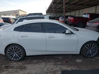 2021 BMW 2 Series 228i xDrive with VIN WBA73AK07M7H56978, listed as a IAAI auction lot 41215710 with 77,965 mi miles and . Bid and sale history available at DreamBid. Image 13.