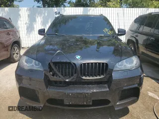 2011 BMW X5 M with VIN 5YMGY0C55BLK27157, listed as a Copart auction lot 65929154 with 0 mi miles and Salvage Title. Bid and sale history available at carsss.com. Image 5.