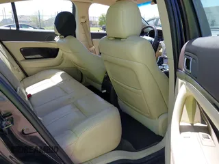 2013 Lincoln MKS z VIN 1LNHL9EK3DG617815, wystawiony jako IAAI lot #42239784 z przebiegiem 122 589 mil mil oraz . Historia ofert i sprzedaży dostępna na DreamBid. Obrazek 8.