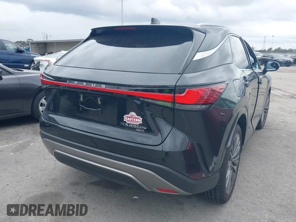 2024 Lexus RX 450h+ Luxury with VIN JTJCJMGA1R2022295, listed as a IAAI auction lot 41778650 with 1,822 mi miles and . Bid and sale history available at DreamBid. Image 4.