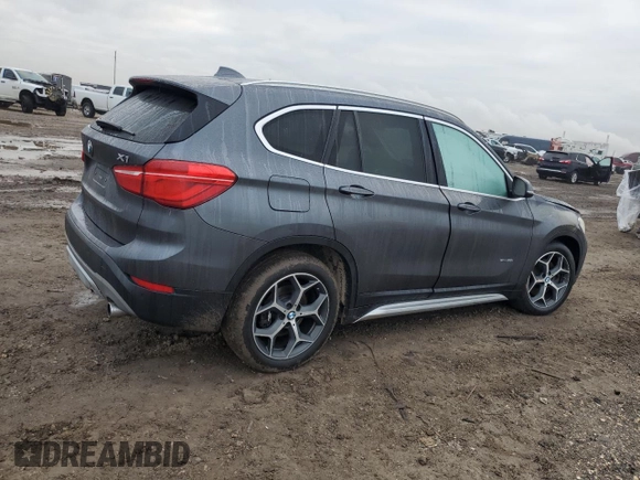 2017 BMW X1 sDrive28i with VIN WBXHU7C3XH5H38074, listed as a Copart auction lot 43088995 with 98,820 mi miles and Salvage Title. Bid and sale history available at carsss.com. Image 3.
