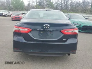 2018 Toyota Camry LE с VIN 4T1B11HK7JU643274, выставлен на аукционе Copart как лот 57064245 с пробегом 162 857 миль миль и Чистый • Clean title. История ставок и продаж доступна на DreamBid. Изображение 6.