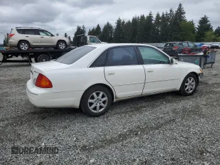 2001 Toyota Avalon XL z VIN 4T1BF28B31U136069, wystawiony jako Copart lot #57355025 z przebiegiem 217 489 mil mil oraz Szkody całkowita. Historia ofert i sprzedaży dostępna na DreamBid. Obrazek 3.