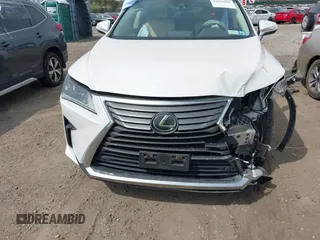 2019 Lexus RX 350 with VIN 2T2BZMCA3KC210705, listed as a IAAI auction lot 42094669 with 57,070 mi miles and . Bid and sale history available at DreamBid. Image 12.
