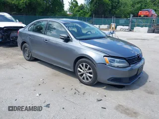 2012 Volkswagen Jetta SE z VIN 3VWDP7AJ4CM323219, wystawiony jako IAAI lot #42290353 z przebiegiem 313 663 mil mil oraz . Historia ofert i sprzedaży dostępna na DreamBid. Obrazek 1.