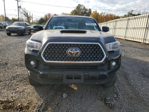2019 Toyota Tacoma 4WD SR5 with VIN 5TFSZ5AN6KX192525, listed as a Copart auction lot 75985314 with 103,761 mi miles and Salvage Title. Bid and sale history available at carsss.com. Image 5.