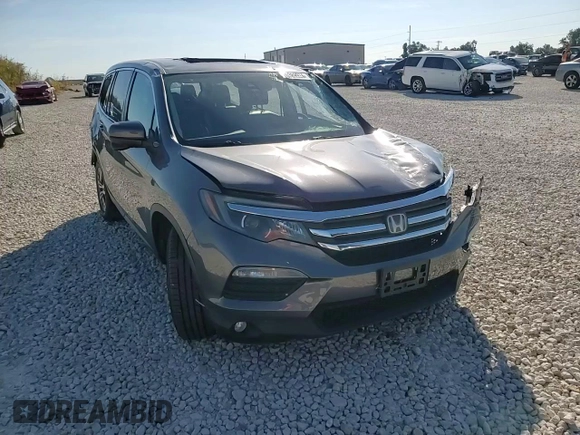 2018 Honda Pilot EX-L с VIN 5FNYF5H6XJB008231, выставлен на аукционе Copart как лот 70389974 с пробегом Не указан миль и Списание • Salvage title. История ставок и продаж доступна на DreamBid. Изображение 12.