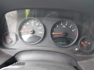 2011 Jeep Patriot Latitude with VIN 1J4NT1GA0BD129377, listed as a IAAI auction lot 42098404 with 212,834 mi miles. Bid and sale history available at carsss.com. Image 7.