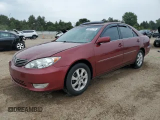 2005 Toyota Camry LE with VIN 4T1BE30KX5U086586, listed as a Copart auction lot 60291715 with 180,421 mi miles and Salvage title. Bid and sale history available at DreamBid. Image 1.