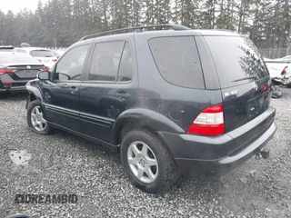 2002 Mercedes-Benz M 320/430/500 z VIN 4JGAB54E72A296354, wystawiony jako IAAI lot #41277897 z przebiegiem 101 842 mil mil oraz . Historia ofert i sprzedaży dostępna na DreamBid. Obrazek 3.