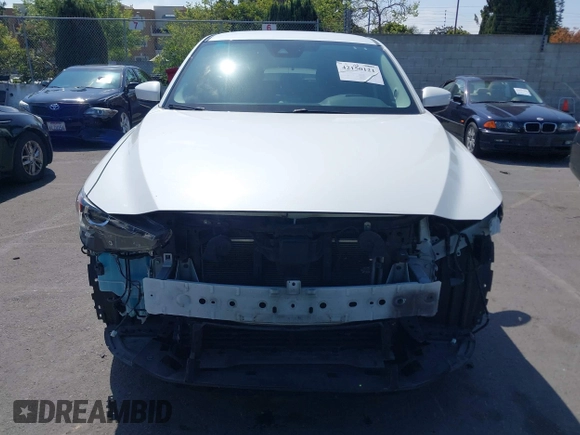 2018 Mazda CX-5 Touring with VIN JM3KFACM0J0416716, listed as a IAAI auction lot 42150121 with 61,332 mi miles and . Bid and sale history available at carsss.com. Image 13.