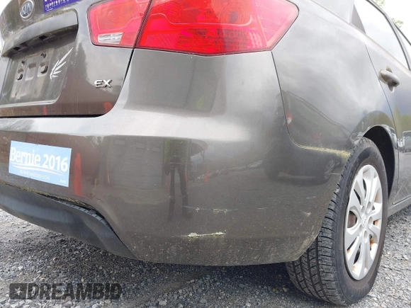 2010 Kia Forte EX with VIN KNAFU4A23A5847814, listed as a IAAI auction lot 42048432 with 97,678 mi miles. Bid and sale history available at carsss.com. Image 14.