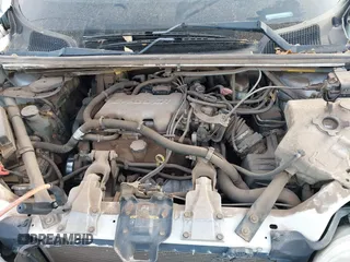 2004 Chevrolet Venture LS with VIN 1GNDX03E04D267200, listed as a IAAI auction lot 41392552 with 165,704 mi miles. Bid and sale history available at carsss.com. Image 10.