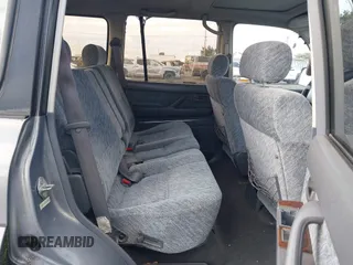 1995 Toyota Land Cruiser z VIN JT3DJ81W0S0094999, wystawiony jako IAAI lot #41583748 z przebiegiem 93 454 mil mil oraz . Historia ofert i sprzedaży dostępna na DreamBid. Obrazek 8.