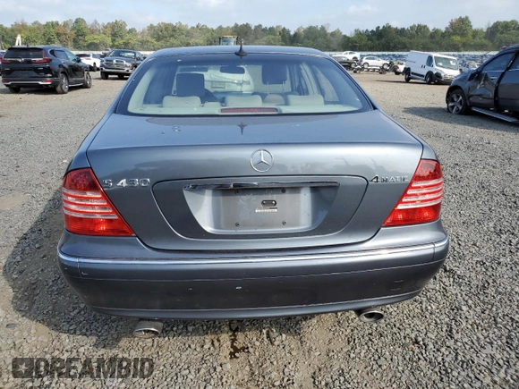 2005 Mercedes-Benz S-Class 4.3L with VIN WDBNG83J65A454791, listed as a Copart auction lot 70132074 with 221,612 mi miles and Salvage Title. Bid and sale history available at carsss.com. Image 6.