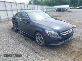 2017 Mercedes-Benz C 300 with VIN 55SWF4KB1HU192250, listed as a IAAI auction lot 42366586 with 141,848 mi miles and . Bid and sale history available at DreamBid. Image 1.
