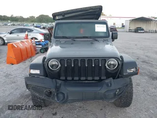 2022 Jeep Wrangler Unlimited Sport with VIN 1C4HJXDN9NW241154, listed as a IAAI auction lot 40211944 with 31,344 mi miles and . Bid and sale history available at DreamBid. Image 12.