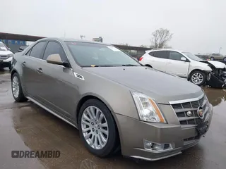2010 Cadillac CTS with VIN 1G6DK5EG0A0137216, listed as a IAAI auction lot 41966117 with 177,686 mi miles and . Bid and sale history available at DreamBid. Image 1.