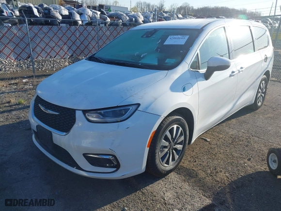 2023 Chrysler Pacifica Hybrid Touring L with VIN 2C4RC1L74PR562240, listed as a IAAI auction lot 42060669 with 45,882 mi miles. Bid and sale history available at carsss.com. Image 17.