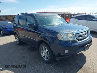 2011 Honda Pilot Touring z VIN 5FNYF4H94BB087319, wystawiony jako IAAI lot #42232958 z przebiegiem 188 629 mil mil oraz . Historia ofert i sprzedaży dostępna na DreamBid. Obrazek 1.