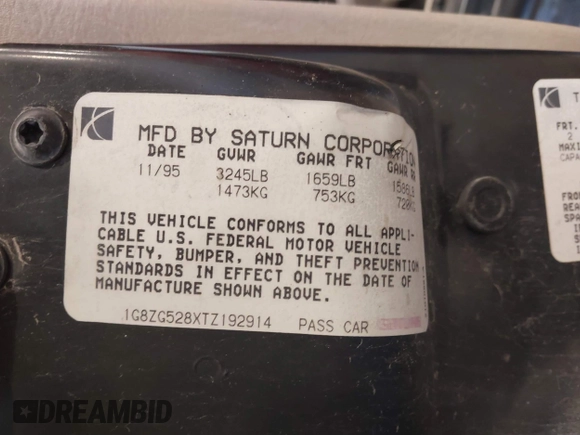 1996 Saturn SL with VIN 1G8ZG528XTZ192914, listed as a IAAI auction lot 41604499 with 126,180 mi miles. Bid and sale history available at carsss.com. Image 9.
