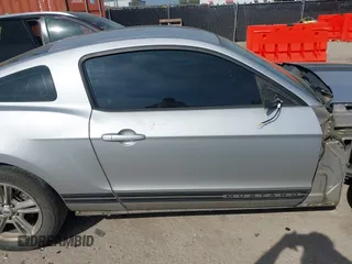 2012 Ford Mustang Premium with VIN 1ZVBP8AM5C5234532, listed as a IAAI auction lot 41860791 with 106,929 mi miles and . Bid and sale history available at DreamBid. Image 13.