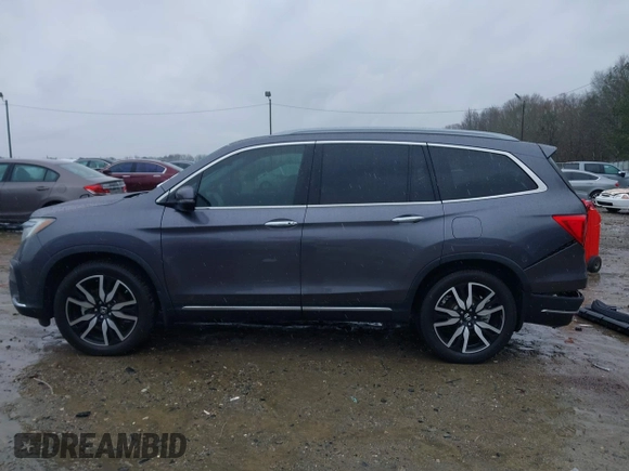 2021 Honda Pilot Touring 8-Passenger with VIN 5FNYF5H9XMB014190, listed as a IAAI auction lot 41749586 with 67,602 mi miles and . Bid and sale history available at DreamBid. Image 15.
