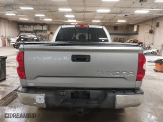 2014 Toyota Tundra 4WD Truck SR with VIN 5TFUY5F17EX357035, listed as a IAAI auction lot 39928076 with 129,831 mi miles. Bid and sale history available at carsss.com. Image 16.