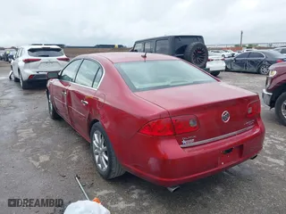 2006 Buick Lucerne CXS with VIN 1G4HE57YX6U162017, listed as a IAAI auction lot 41907074 with 106,909 mi miles. Bid and sale history available at carsss.com. Image 3.