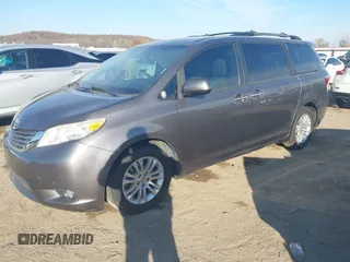 2016 Toyota Sienna XLE with VIN 5TDYK3DC6GS710062, listed as a IAAI auction lot 40953646 with 145,233 mi miles. Bid and sale history available at carsss.com. Image 16.