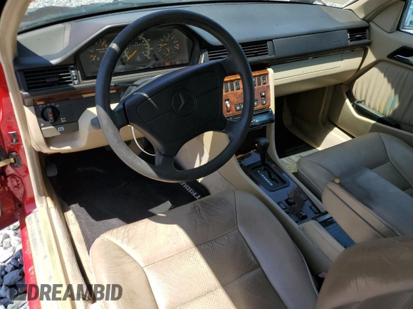 1995 Mercedes-Benz E 320 with VIN WDBEA66E3SC260806, listed as a Copart auction lot 55919665 with 114,083 mi miles and Salvage Title. Bid and sale history available at DreamBid. Image 8.