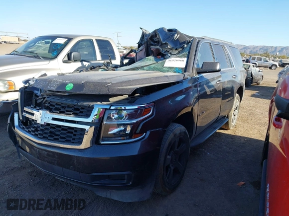 2015 Chevrolet Tahoe LT with VIN 1GNSCBKC0FR167957, listed as a IAAI auction lot 41526568 with Not provided miles and . Bid and sale history available at DreamBid. Image 2.