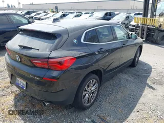 2019 BMW X2 sDrive28i with VIN WBXYJ3C58KEP77334, listed as a IAAI auction lot 42575165 with 98,910 mi miles and . Bid and sale history available at DreamBid. Image 4.