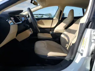 2013 Tesla Model S with VIN 5YJSA1CG2DFP17298, listed as a Copart auction lot 89166515 with 57,615 mi miles and Salvage Title. Bid and sale history available at carsss.com. Image 7.