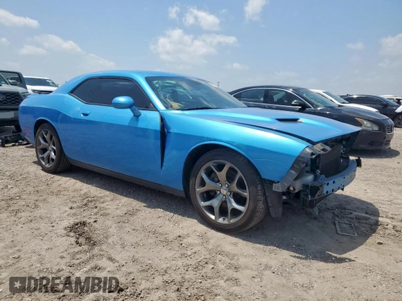 2015 Dodge Challenger SXT Plus with VIN 2C3CDZBG7FH877979, listed as a Copart auction lot 56392215 with 125,681 mi miles and Salvage title. Bid and sale history available at DreamBid. Image 4.