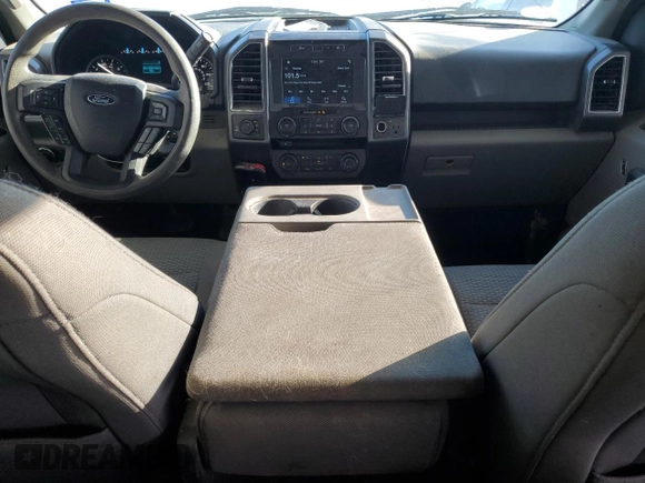 2018 Ford F-150 XL with VIN 1FTEW1E58JFA19859, listed as a Copart auction lot 63862625 with 77,463 mi miles and Salvage title. Bid and sale history available at DreamBid. Image 8.