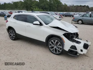 2022 BMW X2 sDrive28i with VIN WBXYH9C0XN5T46405, listed as a Copart auction lot 70291554 with 28,035 mi miles and Salvage Title. Bid and sale history available at carsss.com. Image 4.