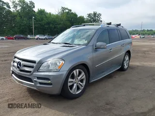 2012 Mercedes-Benz GL 450 z VIN 4JGBF7BEXCA766840, wystawiony jako IAAI lot #42521600 z przebiegiem 154 811 mil mil oraz . Historia ofert i sprzedaży dostępna na DreamBid. Obrazek 17.