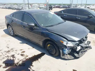 2014 Mazda 6 i Touring with VIN JM1GJ1V55E1105379, listed as a IAAI auction lot 42010585 with 153,870 mi miles and . Bid and sale history available at DreamBid. Image 1.