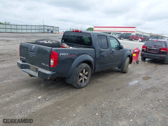 2011 Nissan Frontier PRO-4X with VIN 1N6AD0EV0BC442076, listed as a IAAI auction lot 41982227 with 345,538 mi miles. Bid and sale history available at carsss.com. Image 4.